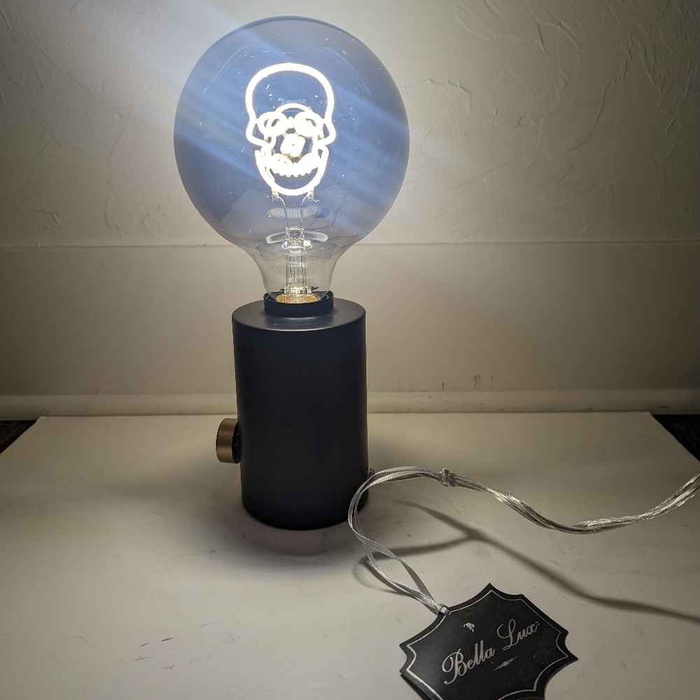 Lamp with skull inside lightbulb
